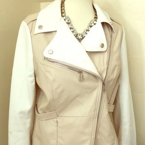 White and cream leather moto jacket by Bebe.